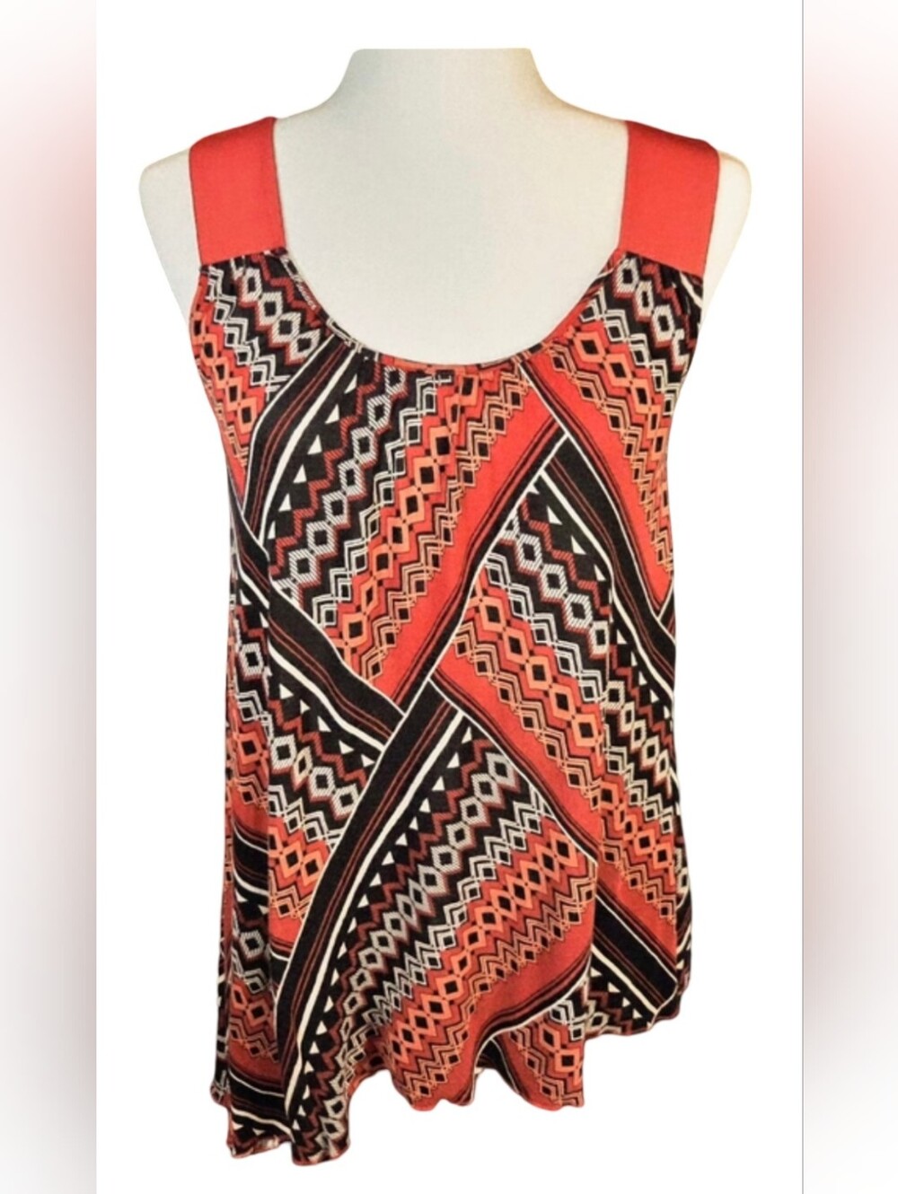 APT. 9 Sleeveless Tunic With A Vibrant Geometric Pattern & "Unique Angled Hem"